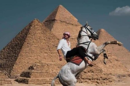 A magical horse or camel tour between the pyramids and the Sphinx